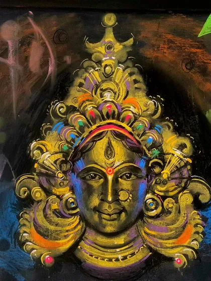 A close-up of the finished chalk art of the Goddess, showing the vibrant colors used.