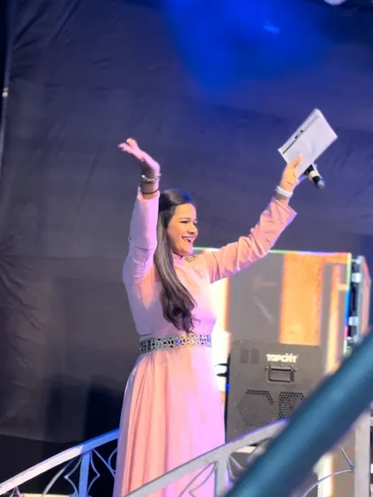 A moment of pure joy and celebration on stage at the end of a successful Sangeet night.