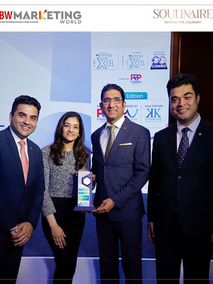Our team holding the Business World Marketing EXCEL Award 2025. We are grateful for this esteemed accolade.