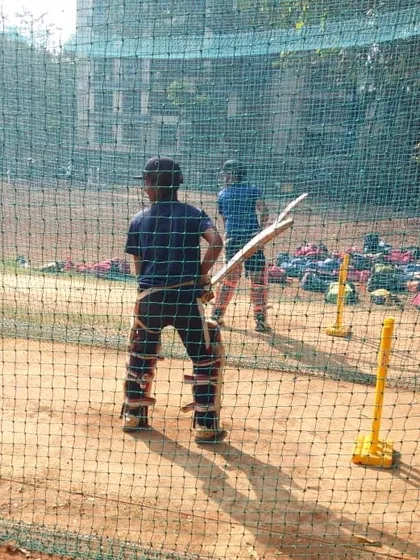 Young batsmen padded up and ready for their turn in the nets. We teach them to be prepared and focused from a young age.