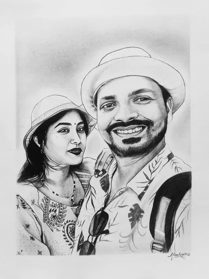A lovely couple's portrait in black and white. I used graphite pencils to create a soft, romantic feel, perfect for capturing a special memory.