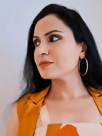 A still shot of the earthy-toned makeup, showing the soft, warm colors that create a fresh and sophisticated look.