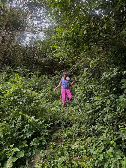 Exploring the lush green paths of my home. My philosophy is rooted in reconnecting with nature and our origins.
