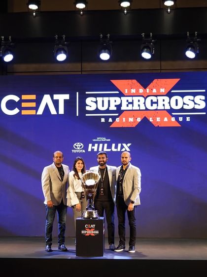 The organizers of the Indian Supercross Racing League pose with the championship trophy. We produced the launch event and auction that officially kicked off this new era in Indian motorsport.