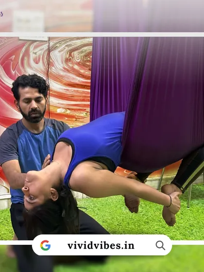Feeling adventurous? I'm here to guide you. This image shows me assisting a student in a gentle backbend, helping to open the chest and shoulders safely.