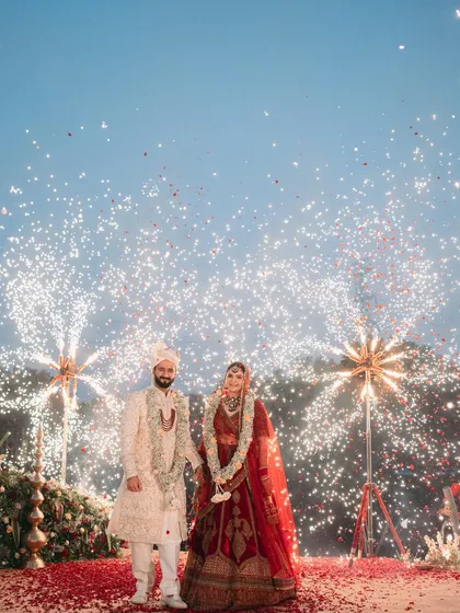 A Varmala moment that lights up the sky. We believe the big moments should feel larger than life, and for this couple at Oleander Farms, we made sure their union was celebrated with a spectacular firework display.