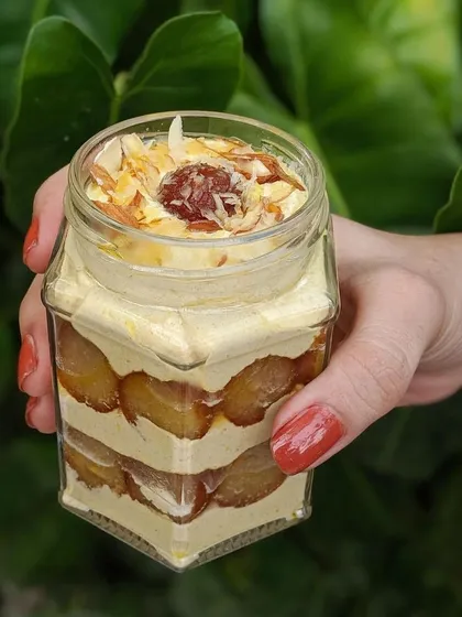 The Thandai Gulab Jamun Mousse Jar features layers of spiced thandai mousse and soft, decadent gulab jamuns for a perfect fusion dessert.