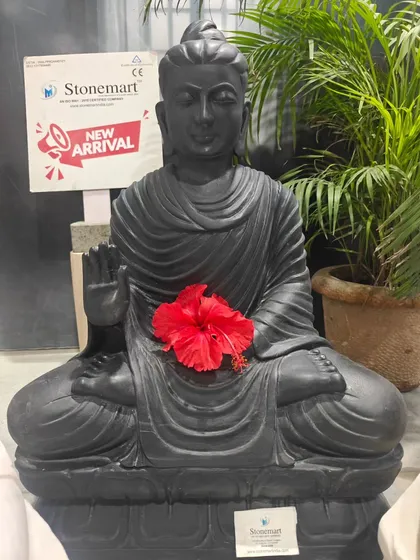 A close-up of our 2-foot black marble Buddha statue. The deep color and smooth texture create a powerful and meditative presence.