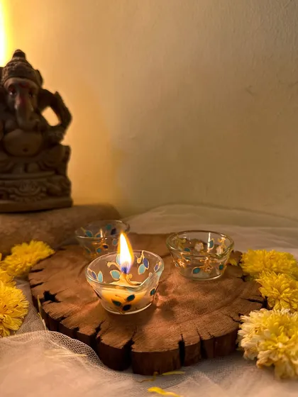 The gentle flame of our glass diyas creates a beautiful, warm glow.