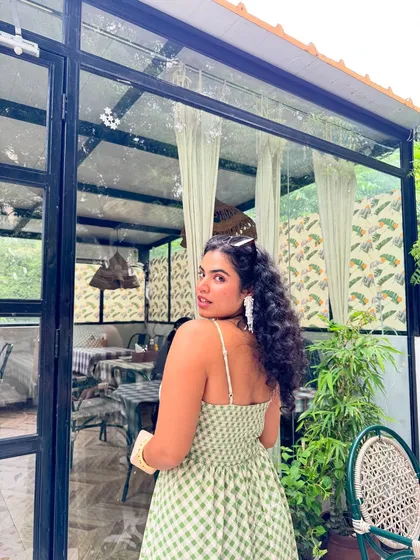 A look over the shoulder. The back of this gingham sundress has a simple tie detail, which adds a nice touch.