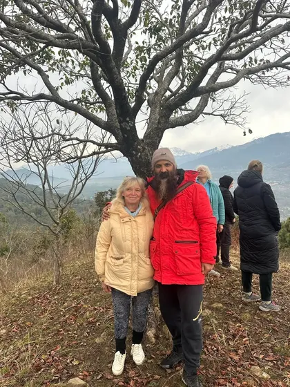 With a student from my European group against the backdrop of the snow-capped Himalayas. The outer world we see is a reflection of our inner state. When we are peaceful inside, we see beauty everywhere.