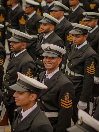 A contingent of smart Indian Navy cadets. The motto "Sam no Varunah" means "May the Lord of the Water be auspicious unto us."