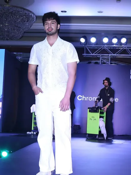 Another shot from the L'Oréal runway show. The model is showcasing the final cut and style while I'm in the background, ready for the next demonstration. These events are a team effort to showcase the latest trends.