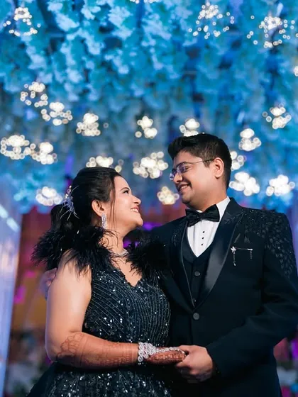 A modern fairytale moment from a reception. The grand decor and dreamy lighting create a magical backdrop, but our focus is always on the connection between the couple.