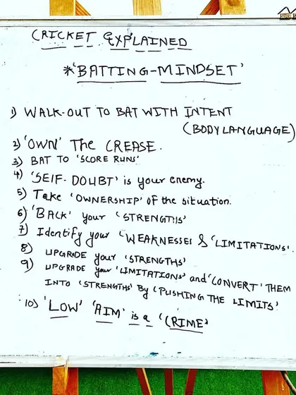 This whiteboard outlines our batting mindset philosophy. We teach players to walk out with intent, own the crease, back their strengths, and understand that a low aim is a crime.