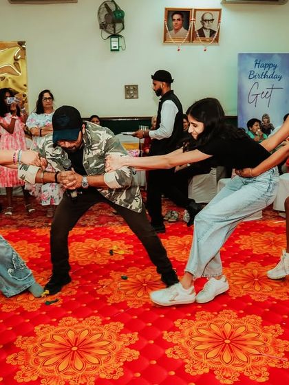 The pure, chaotic fun of a group tug-of-war. It's moments like these, filled with laughter and teamwork, that make a party unforgettable.