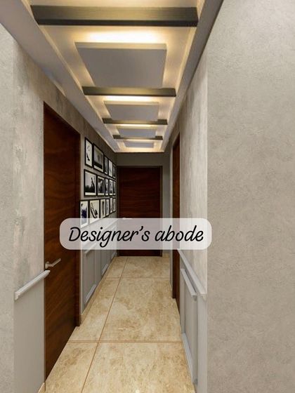 A stunning passage ceiling design that takes interior design to new heights. The intricate coffered pattern with integrated lighting makes this transitional space truly captivating.