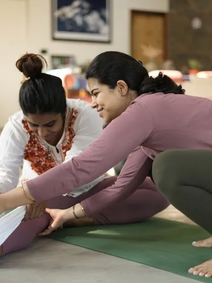 We believe in a hands-on, supportive approach. In our classes, you'll receive personalized adjustments and guidance to help you safely explore your limits and deepen your understanding of each posture. Your growth is our purpose.