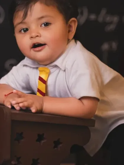 A cute student taking a break from his studies.