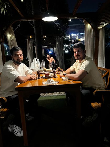 Feeling grateful. Sharing a meal with cricketer Karn Sharma. These moments of downtime are crucial for building camaraderie.