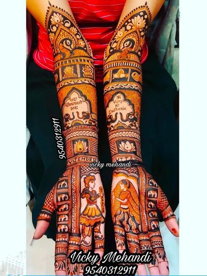 A stunning design featuring a bride and groom in traditional attire, with their names written in Hindi script on the arms.