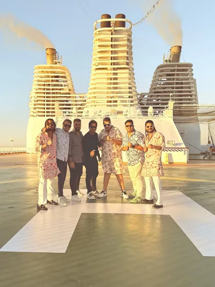 Me and my team on the helipad of the cruise ship. Taking a moment to appreciate the journey and the incredible opportunity to perform in such a unique location.