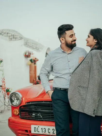 Add a touch of classic Bollywood romance to your shoot with our vintage red convertible. It's one of the many props, like Jeeps and pianos, that we provide to make your photos fun and unique.
