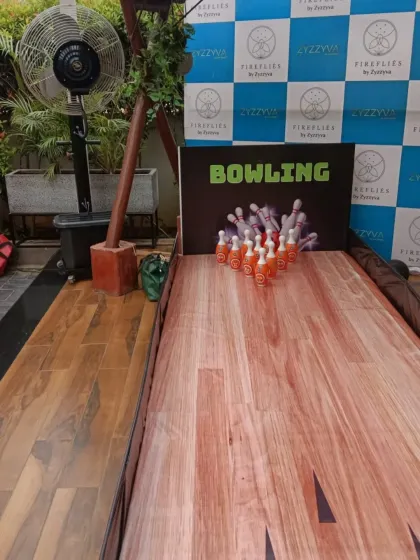 We also offer tabletop game rentals like this mini bowling alley. It's a great addition to a sports-themed party or any event needing compact, competitive fun.
