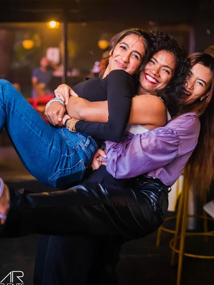 Friends having fun and being playful for the camera.