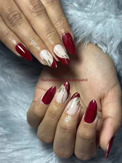 The combination of red, nude, and gold is both classic and striking.