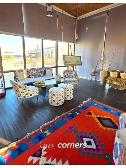 A cozy corner in a luxury Doha resort, showcasing the local aesthetic. When we plan a destination wedding, we immerse your guests in the culture of the location through thoughtful decor and experiences.