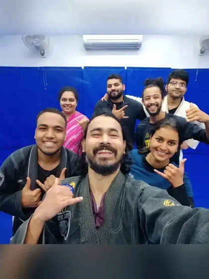 A snapshot of our members, including a student in a saree who joined us on the mats, showing our commitment to inclusivity.