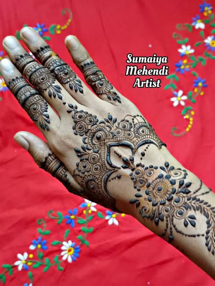 A beautiful and simple design with a heart-shaped center and delicate finger work.