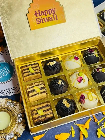 A larger Diwali gift hamper with an assortment of our handcrafted chocolate truffles and sweets. The elegant gold box makes it a luxurious gift for the festival of lights.