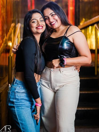 Friends posing for a group photo.