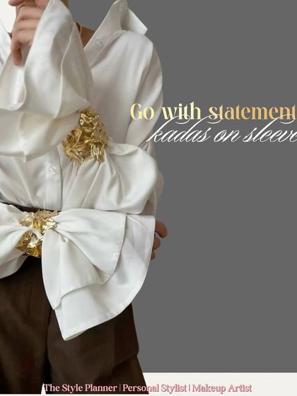 For a bold and unexpected twist, try wearing statement kadas over the sleeves of your white shirt. This is a high-fashion look that is sure to turn heads.