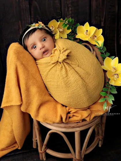 A wide-eyed and wonderfully expressive moment from this little one.