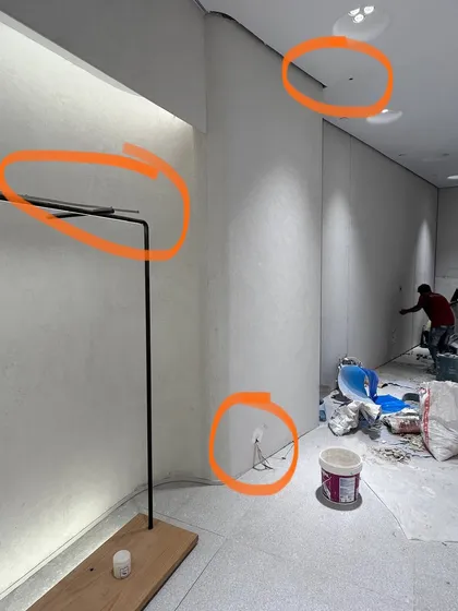 An annotated image from a site inspection, highlighting areas that need correction. This is part of our rigorous Project Management Consultancy (PMC) service, where we ensure every detail, from fixture placement to electrical points, is perfect.