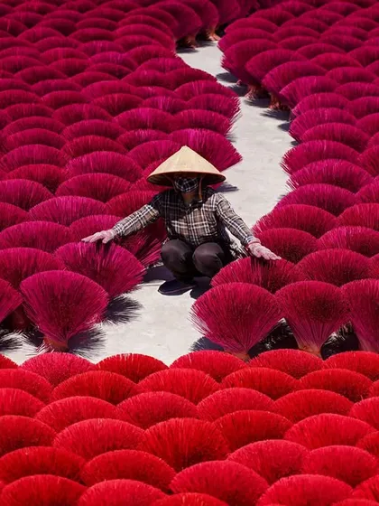 This is the Quang Phu Cau incense village in Vietnam, a sea of red and a testament to tradition. Capturing cultural practices from an aerial perspective reveals patterns and a scale unseen from the ground. It’s a powerful way to tell a story about people and their craft.