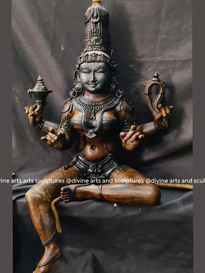 This is the wax model for a Raja Rajeshwari sculpture. The dynamic pose and intricate details are first perfected in wax, capturing the goddess's regal and powerful presence.