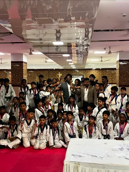 Another shot of the entire academy with our trophies after the tournament. It takes a team to achieve great things, and I am incredibly proud of every single student who participated.