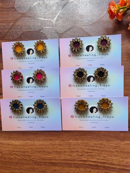 These floral studs are another great option for office or daily wear. They are available in many colors, including red, green, pink, and black, and can be customized.