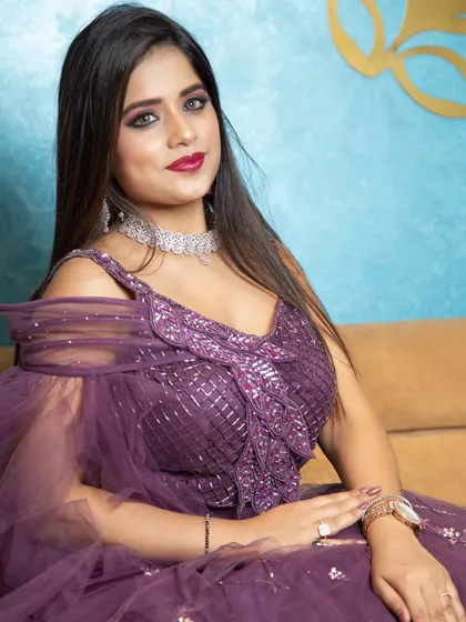 A close-up from the Odhni brand shoot, focusing on the intricate details of the blouse and the model's flawless makeup. This type of shot is perfect for highlighting craftsmanship.