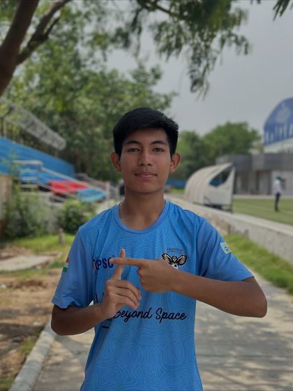 A player makes a hand gesture, showing the personality and character of our team members.