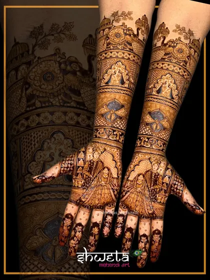 This is a classic example of a full-coverage royal bridal mehendi. Notice the fine lines, detailed patterns, and symmetrical design that covers both arms for a truly grand look.