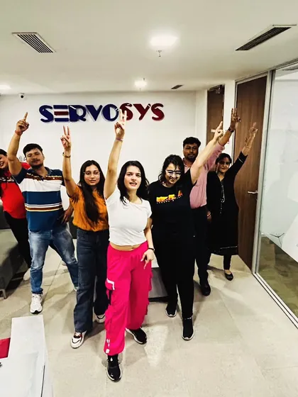 Victory poses with the fantastic crew at Servosys. We danced, we sweat, and we had a blast. That's what corporate wellness should feel like.