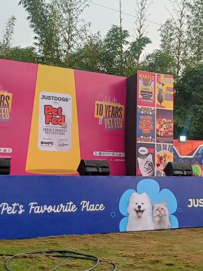 The main stage at Pet Fed Pune, branded for 'Just Dogs'. I construct these stages to be sturdy and visually appealing, providing a central point for announcements, competitions, and entertainment.