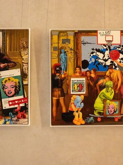 A wider shot showing "Renaissance Reimagined" next to another piece, highlighting the collection's theme of blending classical and pop art.