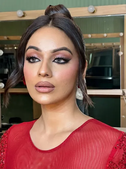 Another angle of this stunning, unfiltered cocktail glam, proving that great makeup looks amazing from every view.