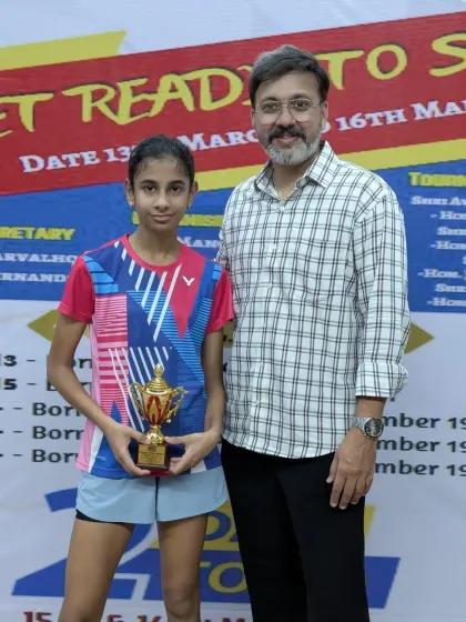 Celebrating with a winner from the women's special tournament. We are committed to fostering talent in both boys and girls.
